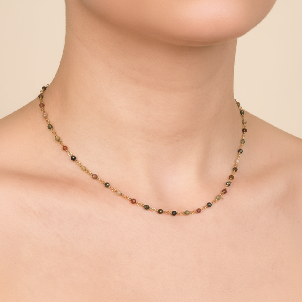 Female wearing 18K gold vermeil multi-coloured agate station necklace handmade by SOIL Jewelry