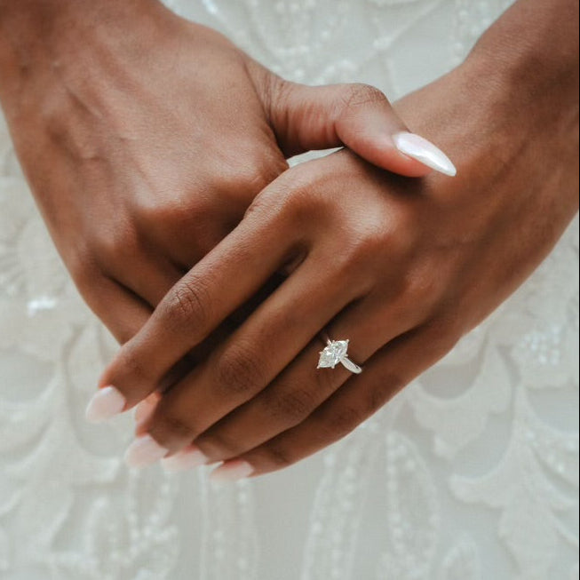 Close up of solid gold marquise diamond ring handcrafted by SOIL Jewelry