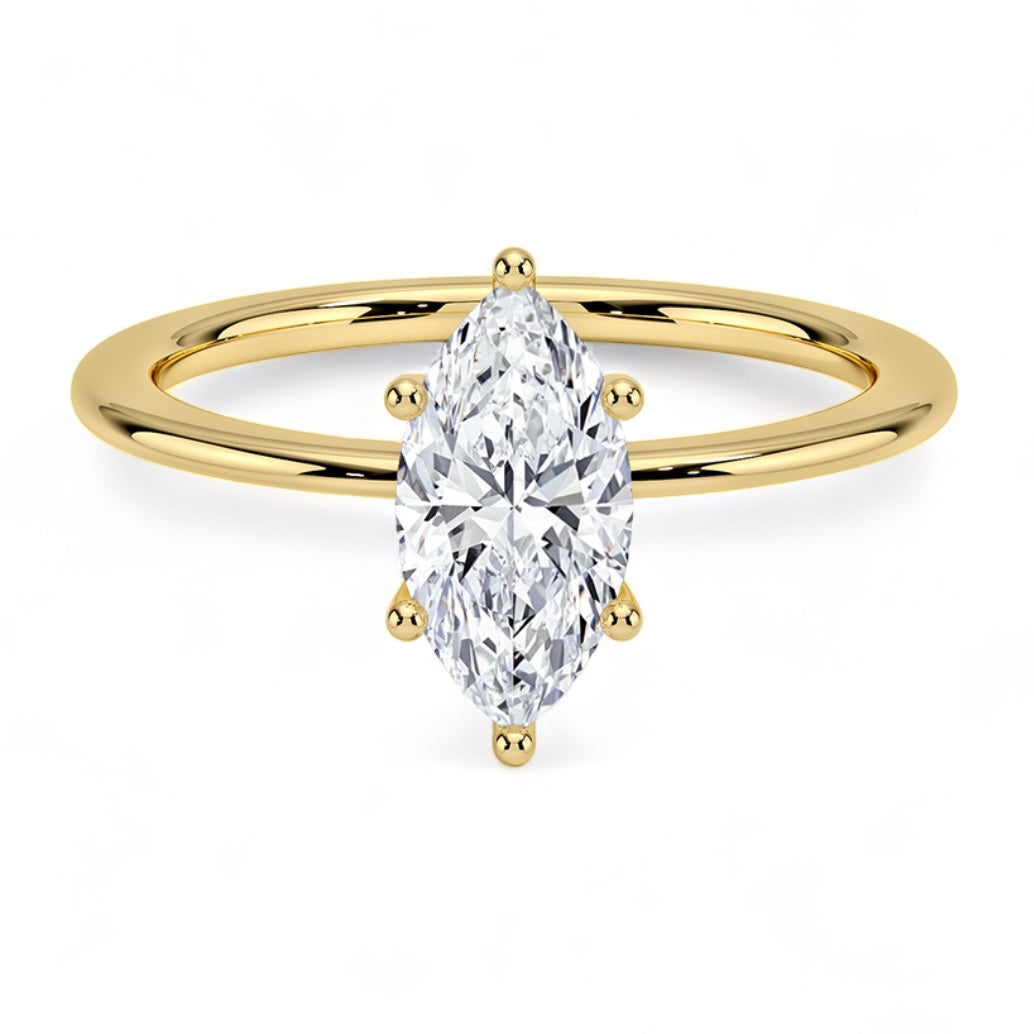 Solid gold marquise diamond ring handcrafted by SOIL Jewelry