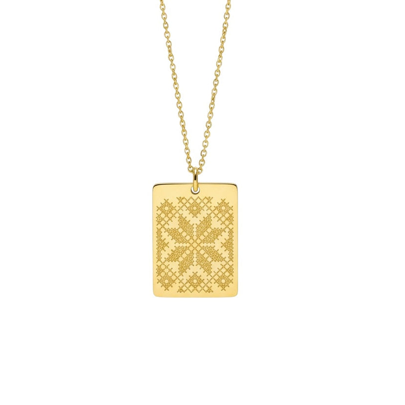Solid gold tatreez pendant handcrafted by SOIL Jewelry