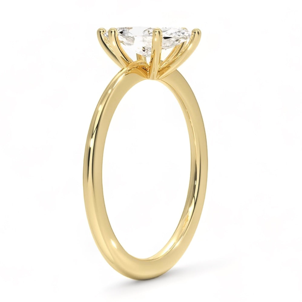 Solid gold marquise diamond ring handcrafted by SOIL Jewelry