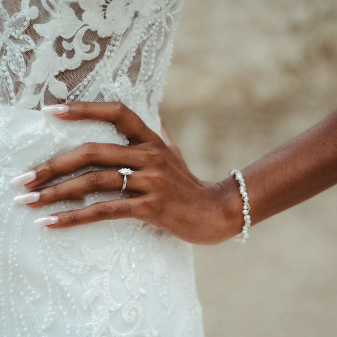 Close up of solid gold marquise diamond ring handcrafted by SOIL Jewelry